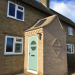 front porch, green door in Oxfordshire