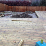 Wood decking area in back garden in Oxfordshire